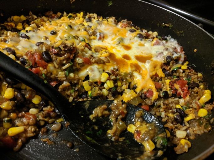 close up view of Cheesy Mexican Lentils, Black Beans and Rice