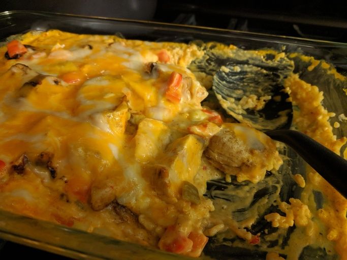 close up view of Smothered Chicken Queso Casserole